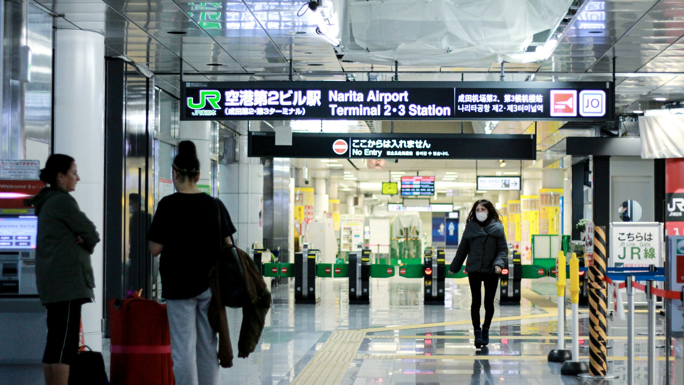 Traveler walking through an airport terminal